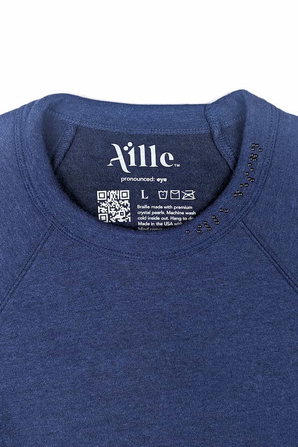 Regular length navy blue sweater close up