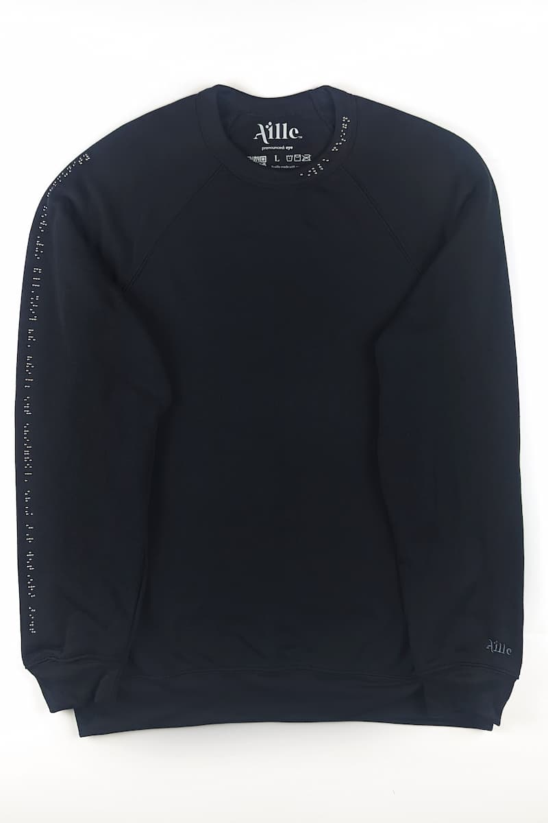 Black regular length sweater with dark grey braille