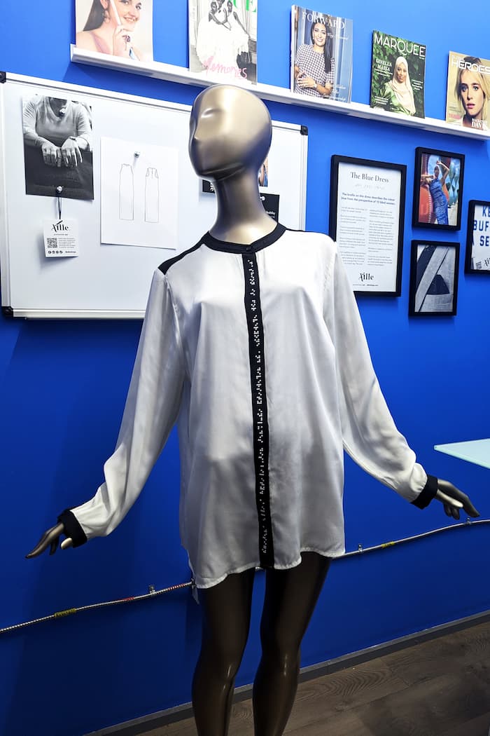 Full length image of braille blouse on mannequin